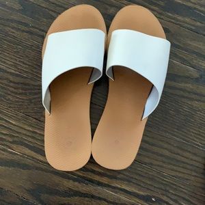 White and tan Sandle